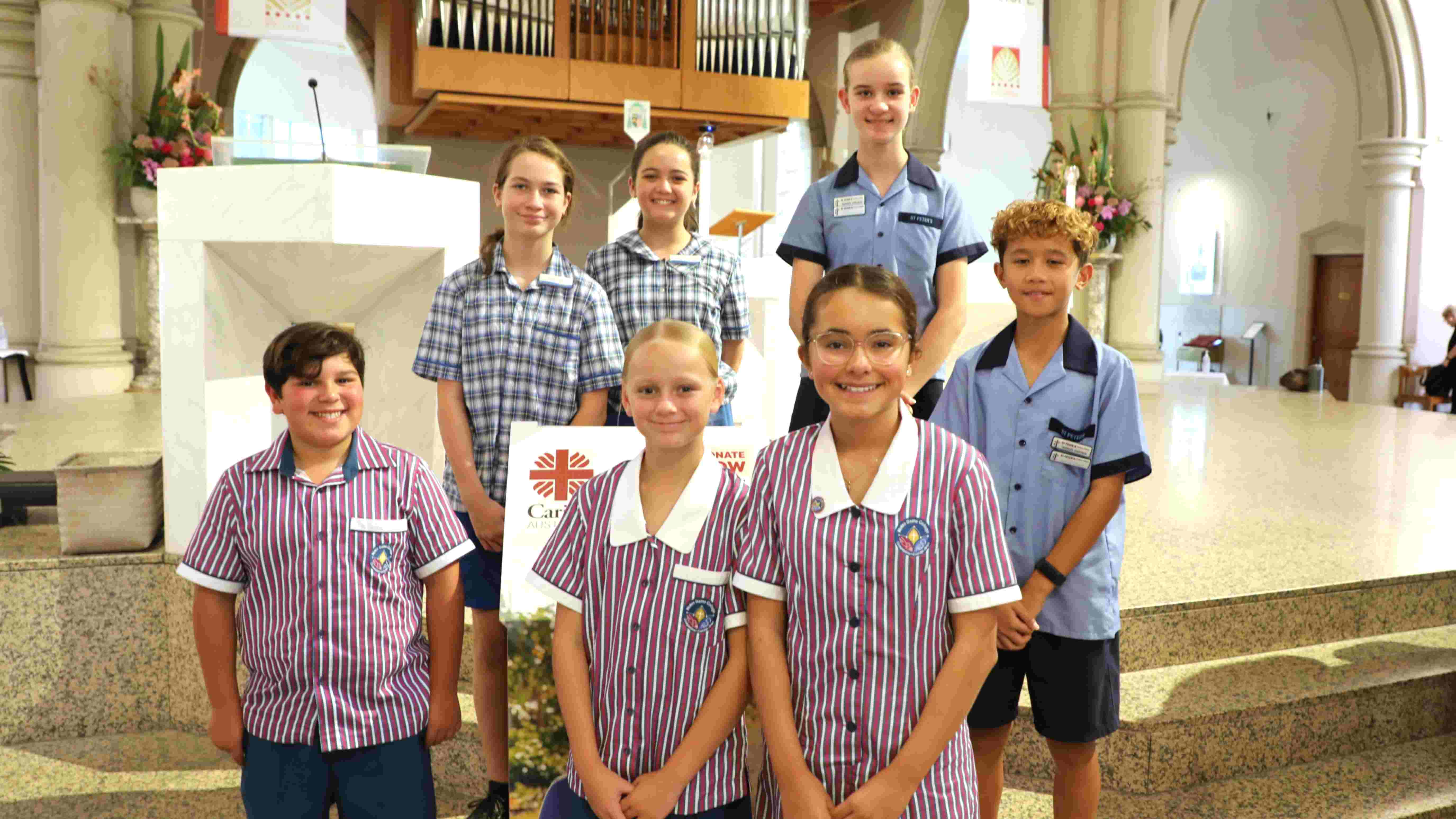 Students gather on the altar at St Stephen's Cathedral